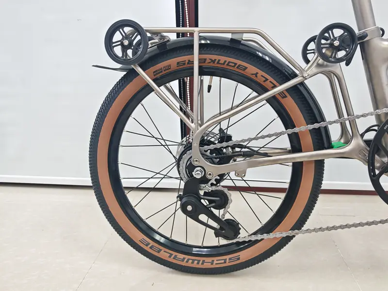 Schwalbe Billy Bonkers tan-wall tyre and titanium rear rack on a Leggero Voyager GT