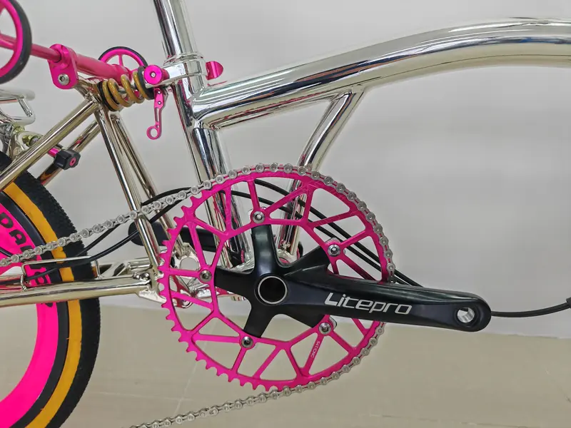 Hot pink anodised parts on the chrome titanium build