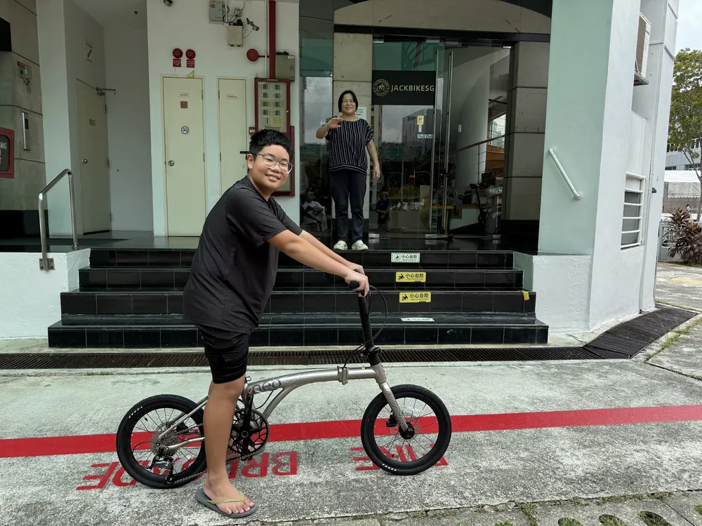 A teenage boy on his new silver Java Neo 3 outside AZ @ Paya Lebar