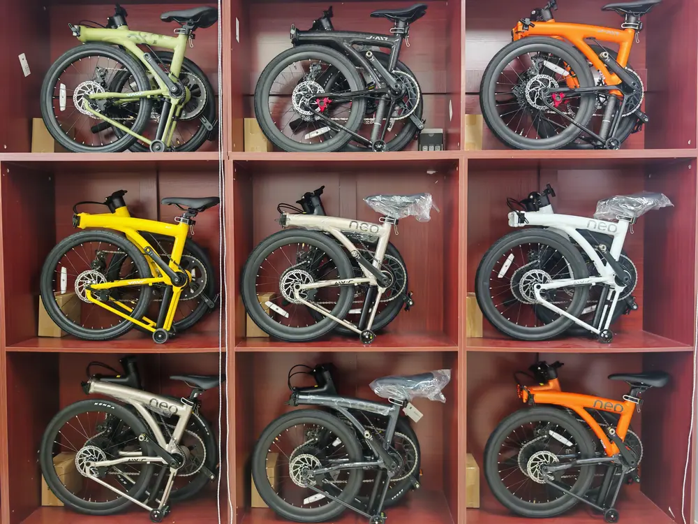 Nine folded Java bikes in the display cubbies at the Jackbikesg showroom
